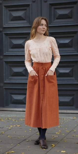 Kobieca spódnica z lnu w odcieniu cynamonu, długość midi, fason rozkloszowany